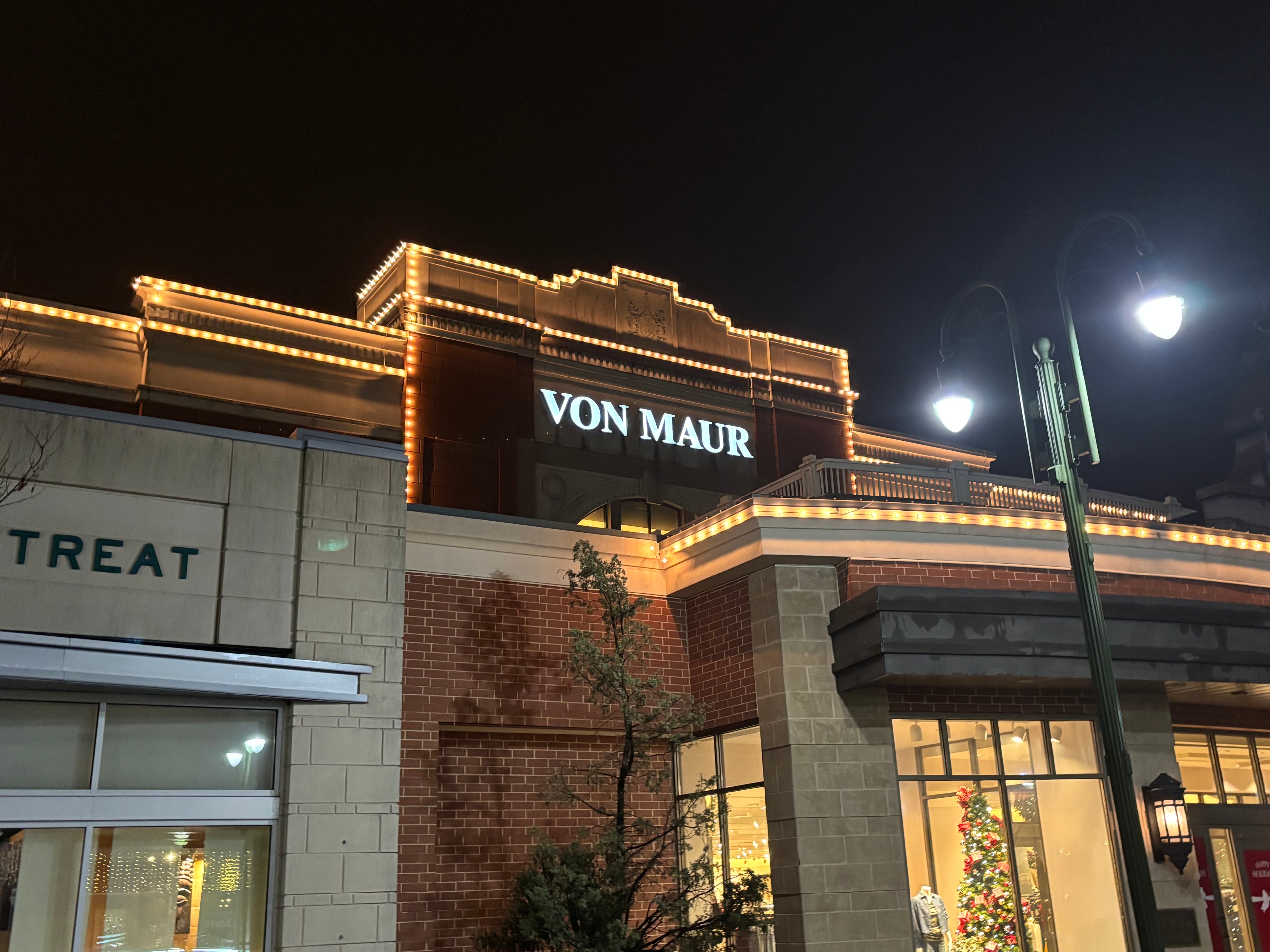 Von Maur at The Greene Town Center outlined with warm-white Christmas lights