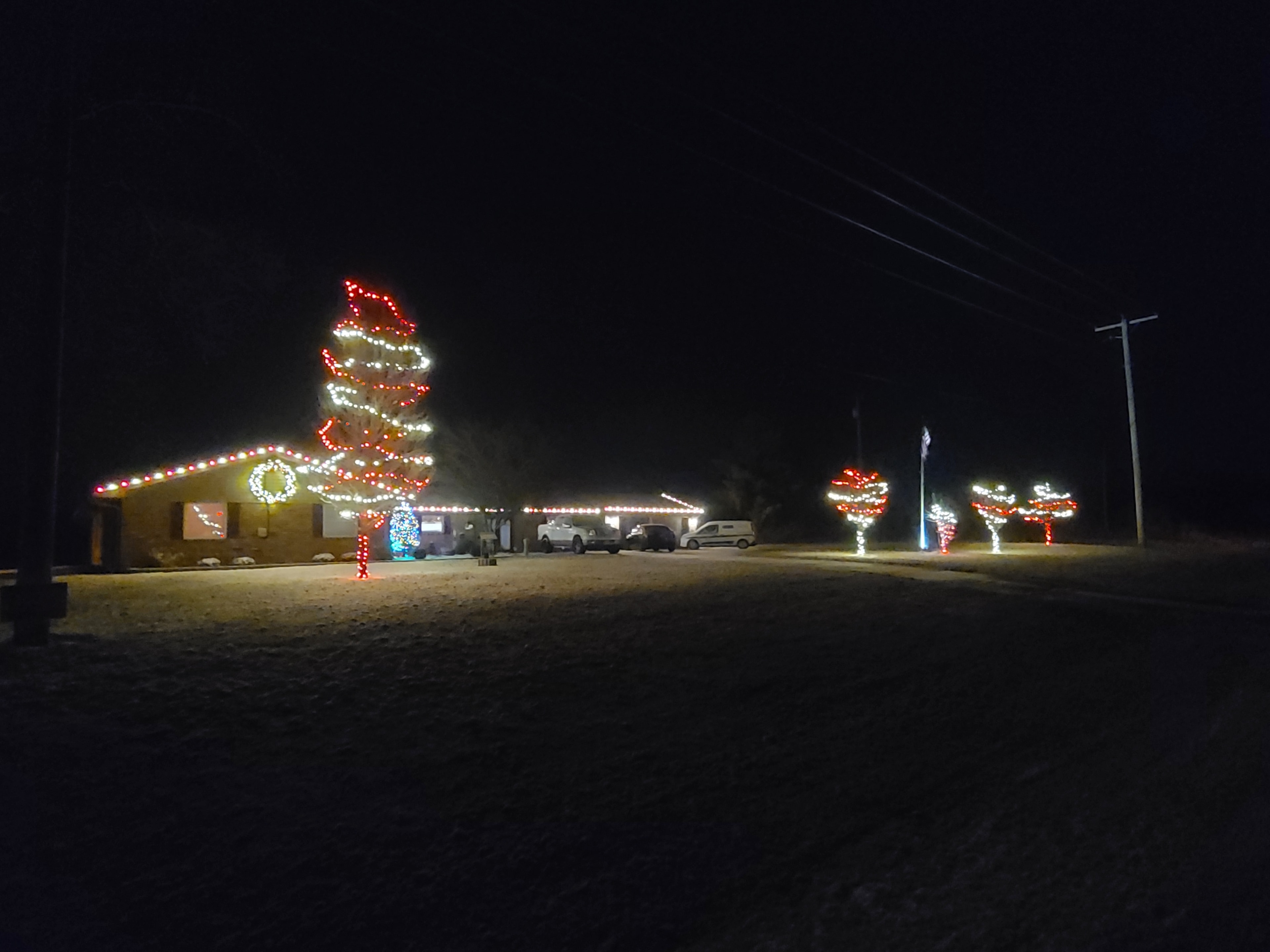 Residential property decorated with red-and-white candy-cane lighting